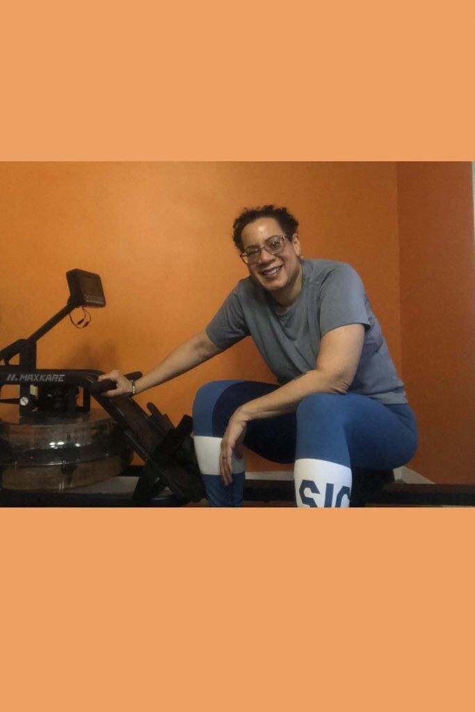 HodgeonRepeat blog - Author Jill Hodge sitting on rowing machine